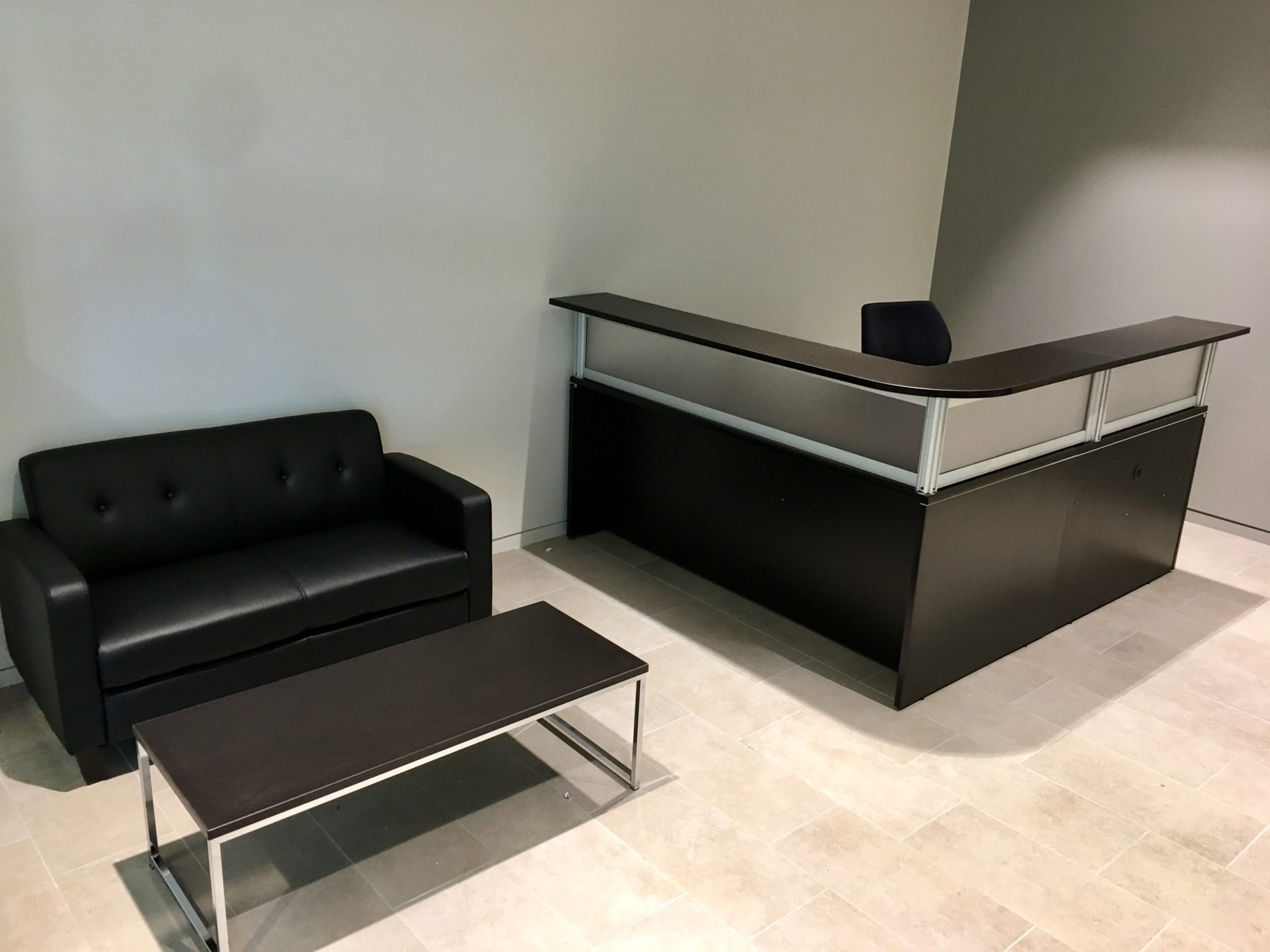 Reception Area in Espresso with Transaction Top & Panels & Sofa